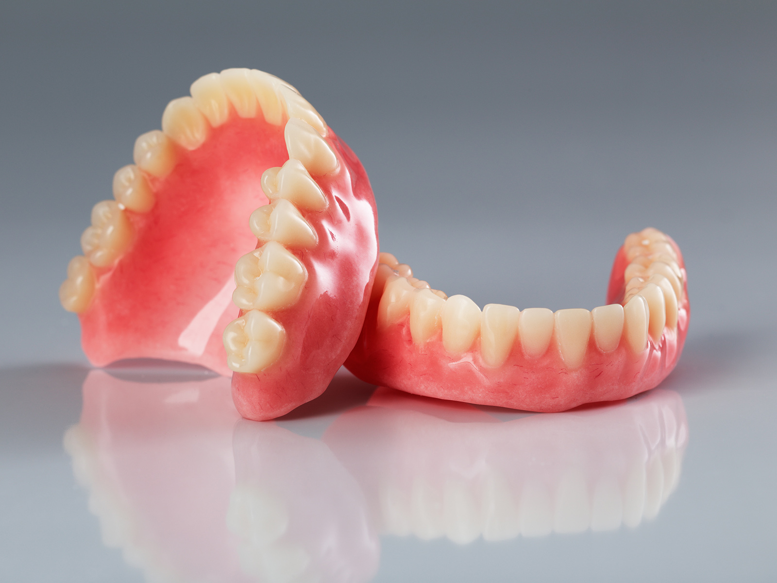 What Is The Difference Between Dentures And False Teeth?